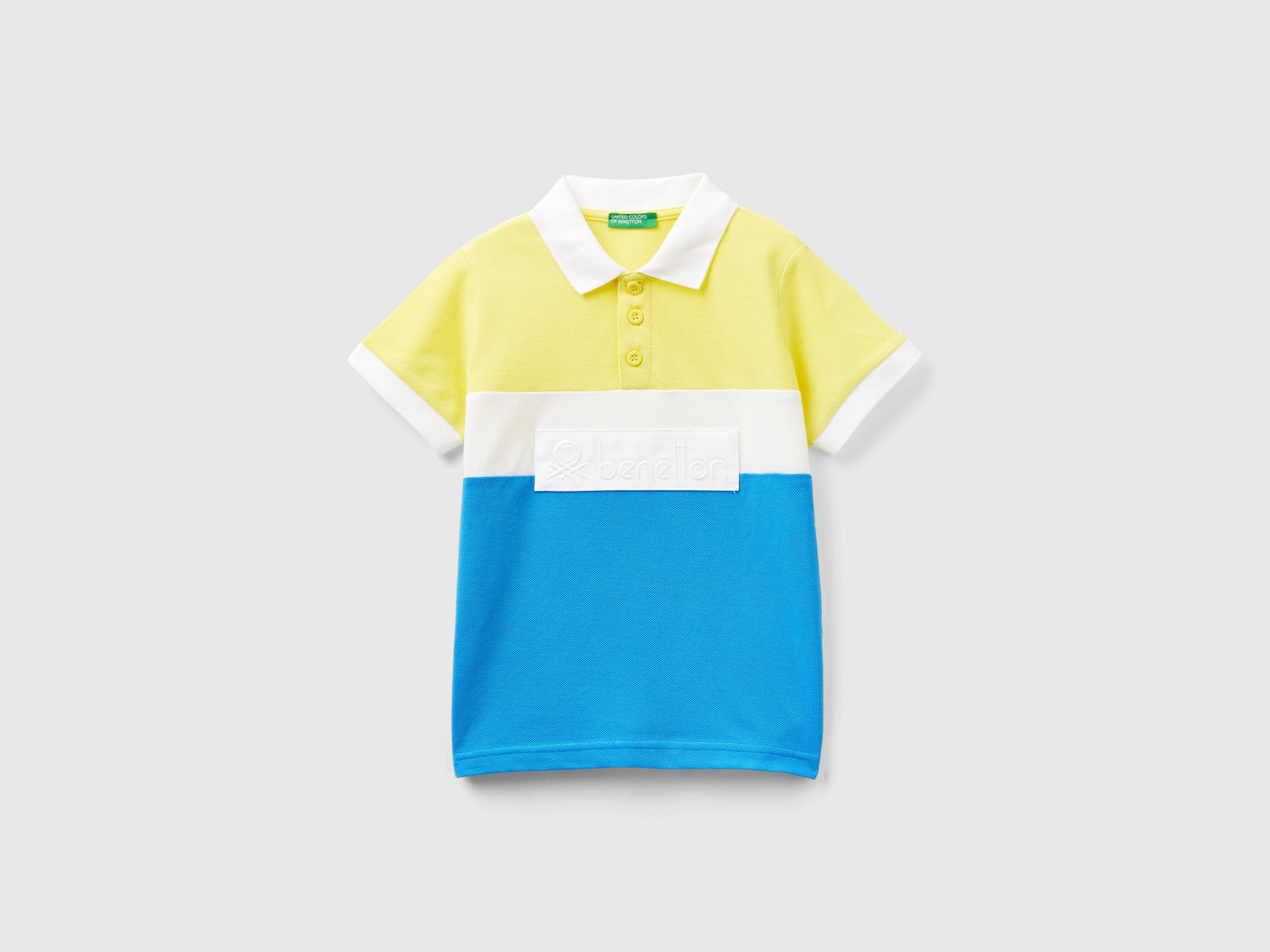 Polo color block con patch da bimbo giallo | Benetton Outlet