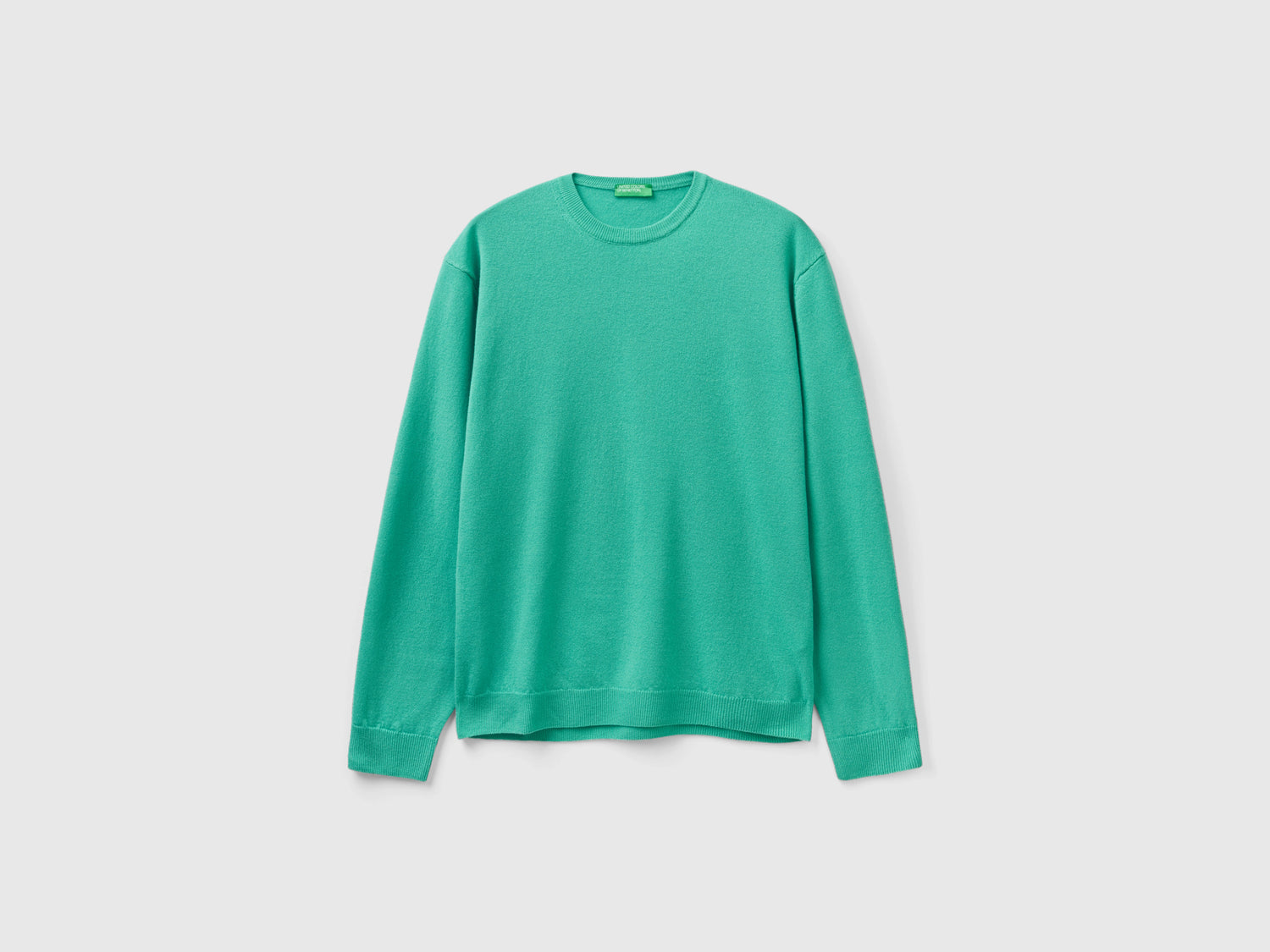 Maglia girocollo chiaro in pura lana Merino da uomo verde | Benetton Outlet