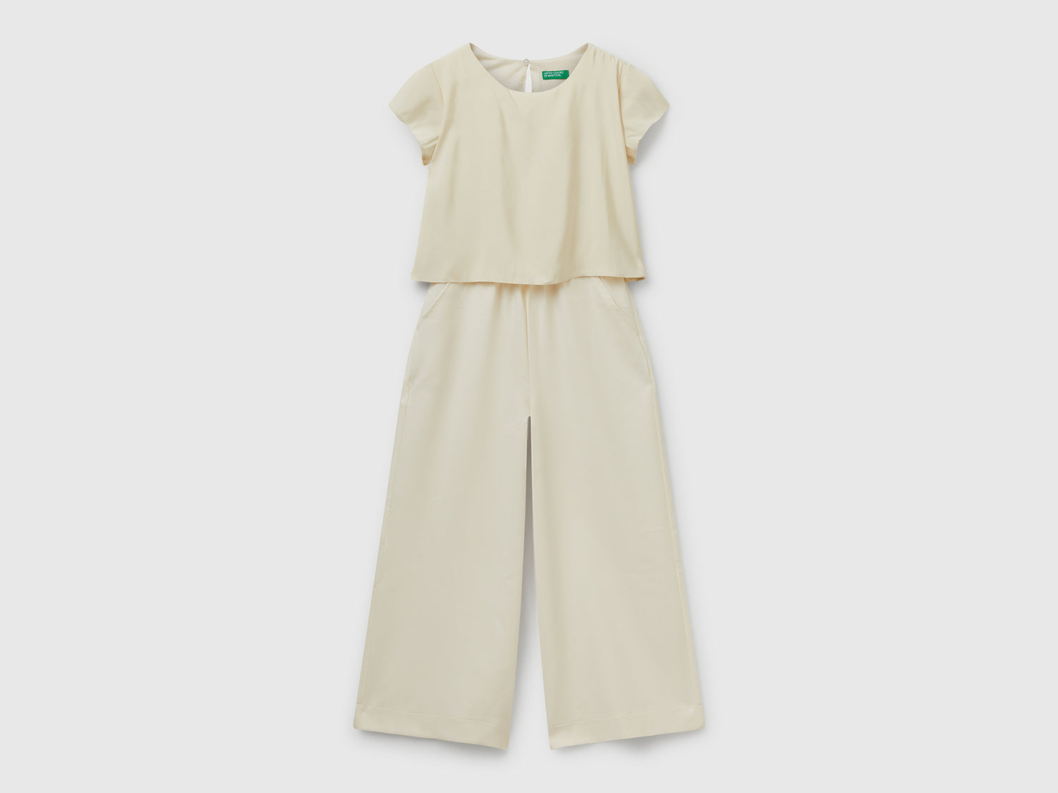 Tuta fluida a manica corta da bambina bianco panna | Benetton Outlet