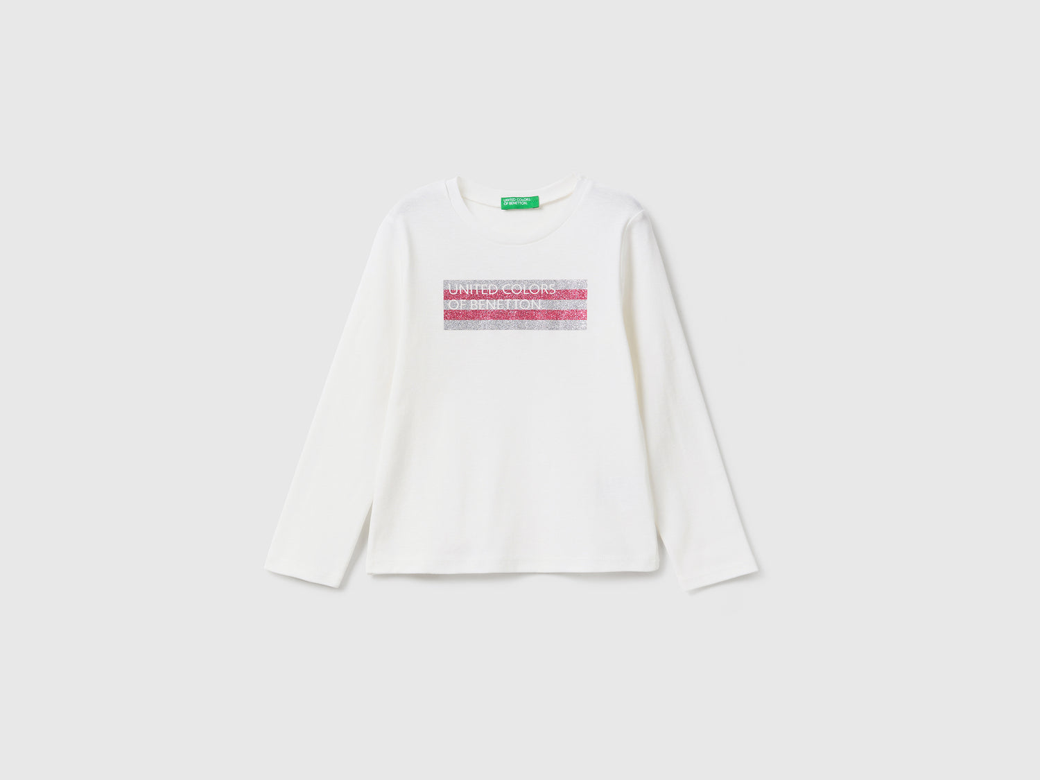 T-shirt in cotone bio con stampa glitter da bimba bianco panna | Benetton Outlet