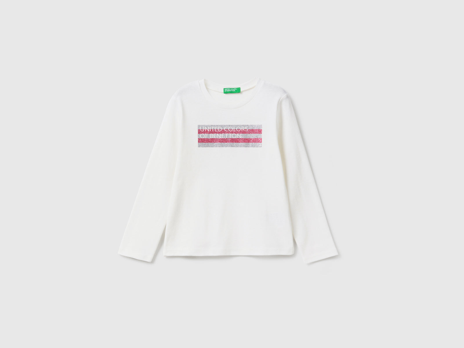 T-shirt in cotone bio con stampa glitter da bimba bianco panna | Benetton Outlet