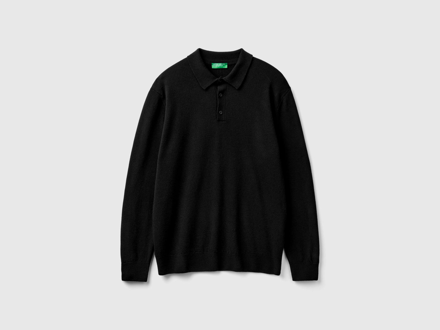 Polo in pura lana Merino da uomo nero | Benetton Outlet