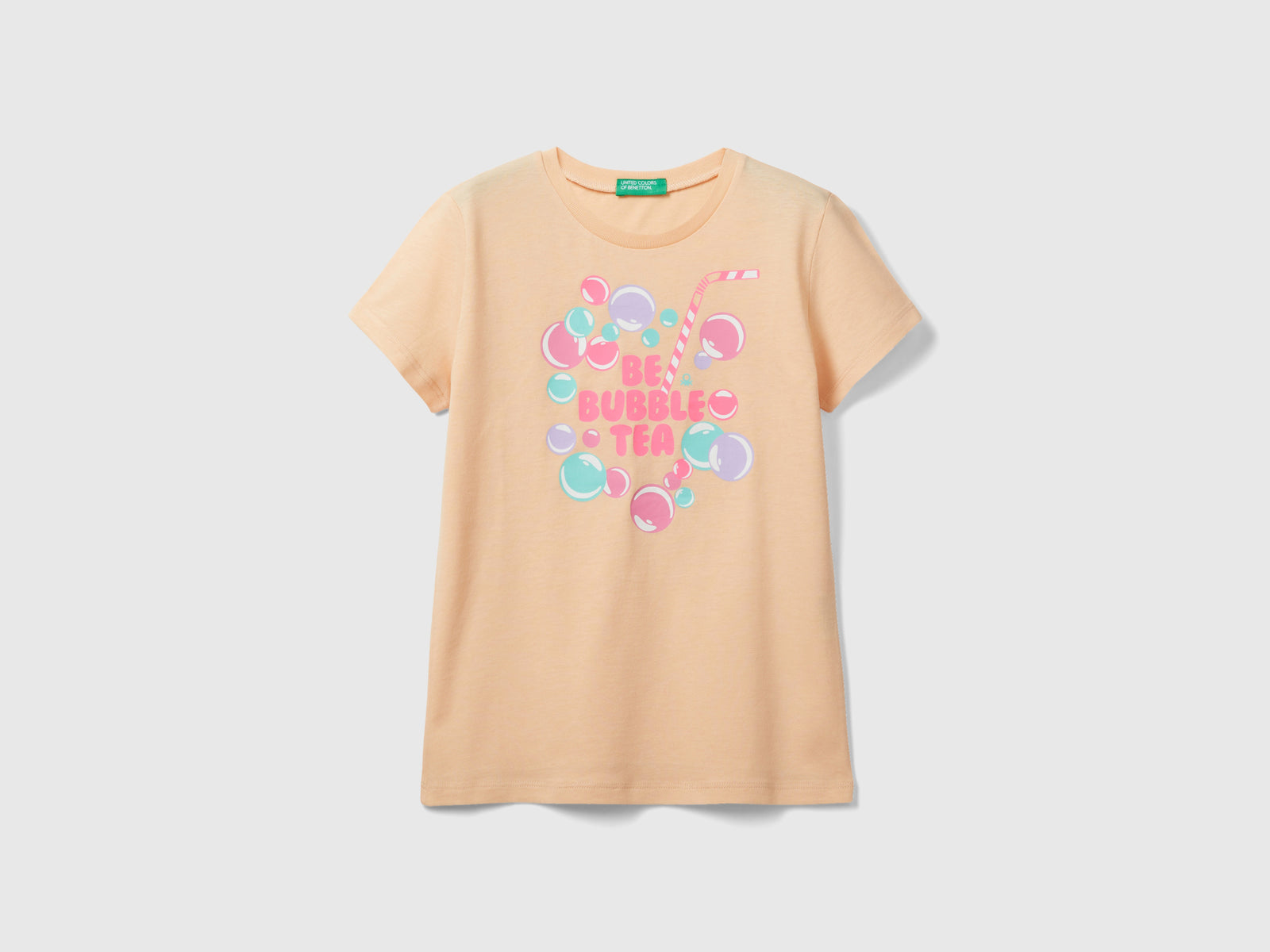 Maglietta con dettagli fluo da bambina pesca | Benetton Outlet