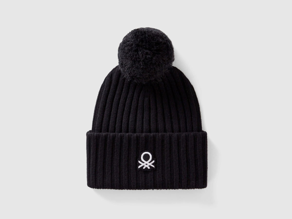 Berretto con logo e pom pom