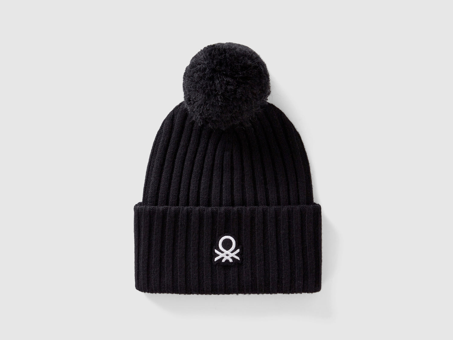 Berretto con logo e pom pom da donna nero | Benetton Outlet