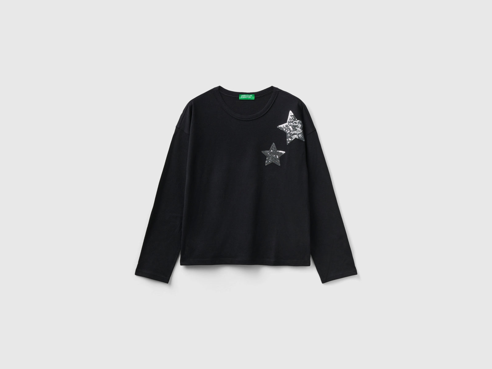 T-shirt con stampa e paillettes da bambina nero | Benetton Outlet