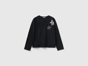 T-shirt con stampa e paillettes
