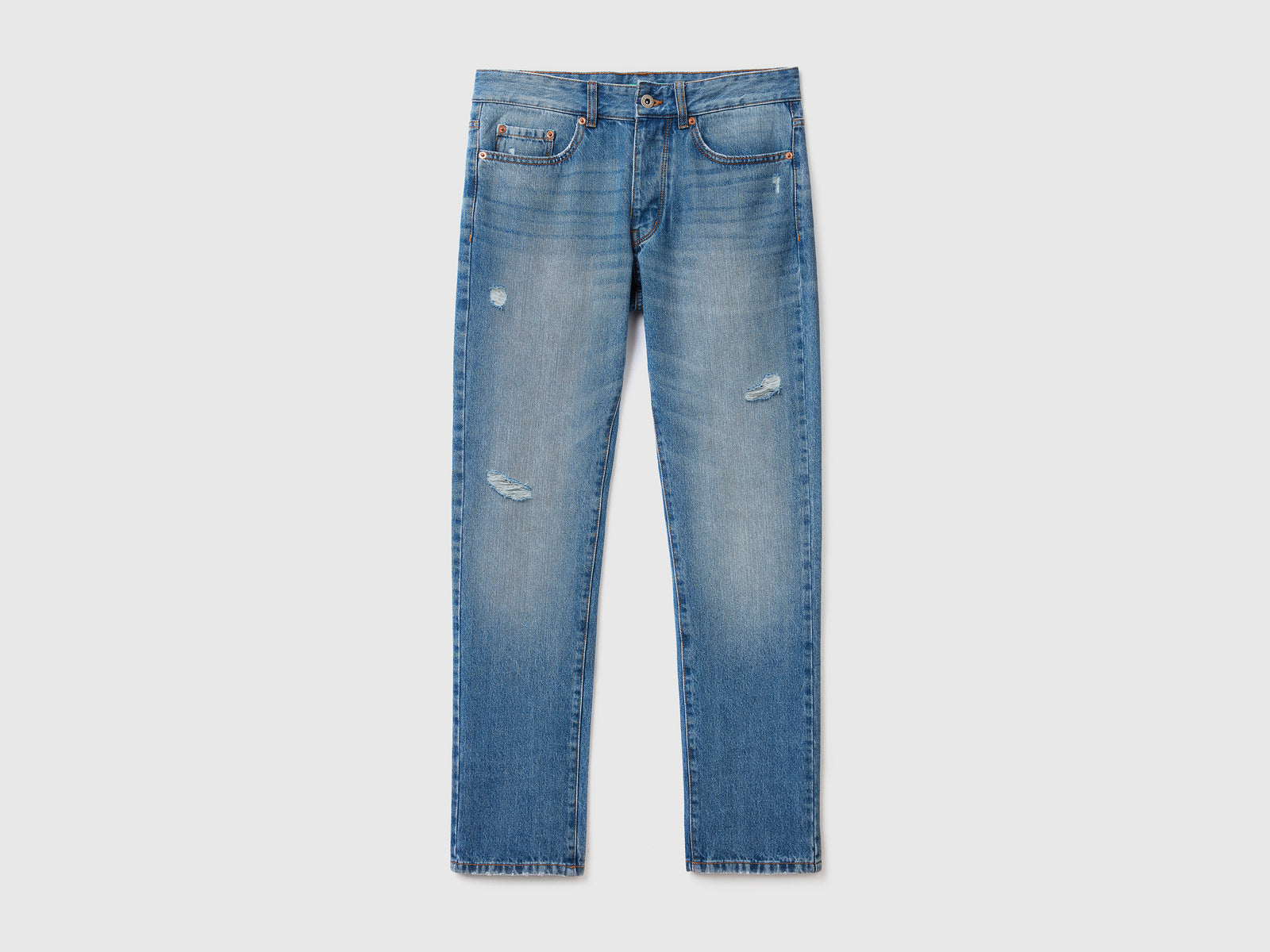 Jeans straight con rotture da uomo celeste | Benetton Outlet