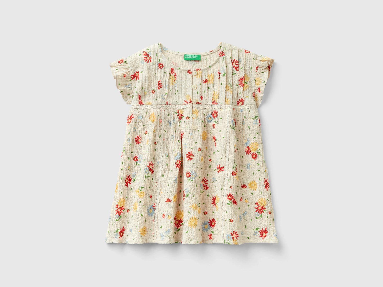 Camicetta a fiori con rouches da bambina bianco panna | Benetton Outlet