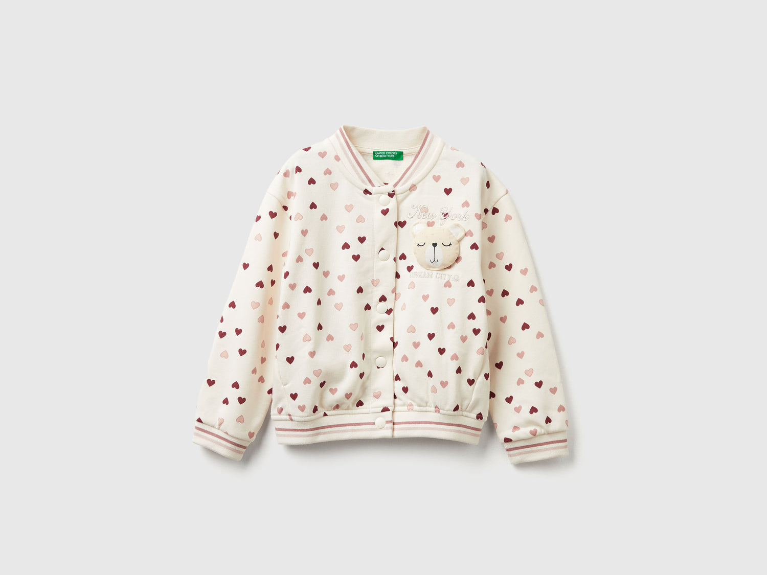 Bomber in felpa con stampa cuori da bimba bianco panna | Benetton Outlet