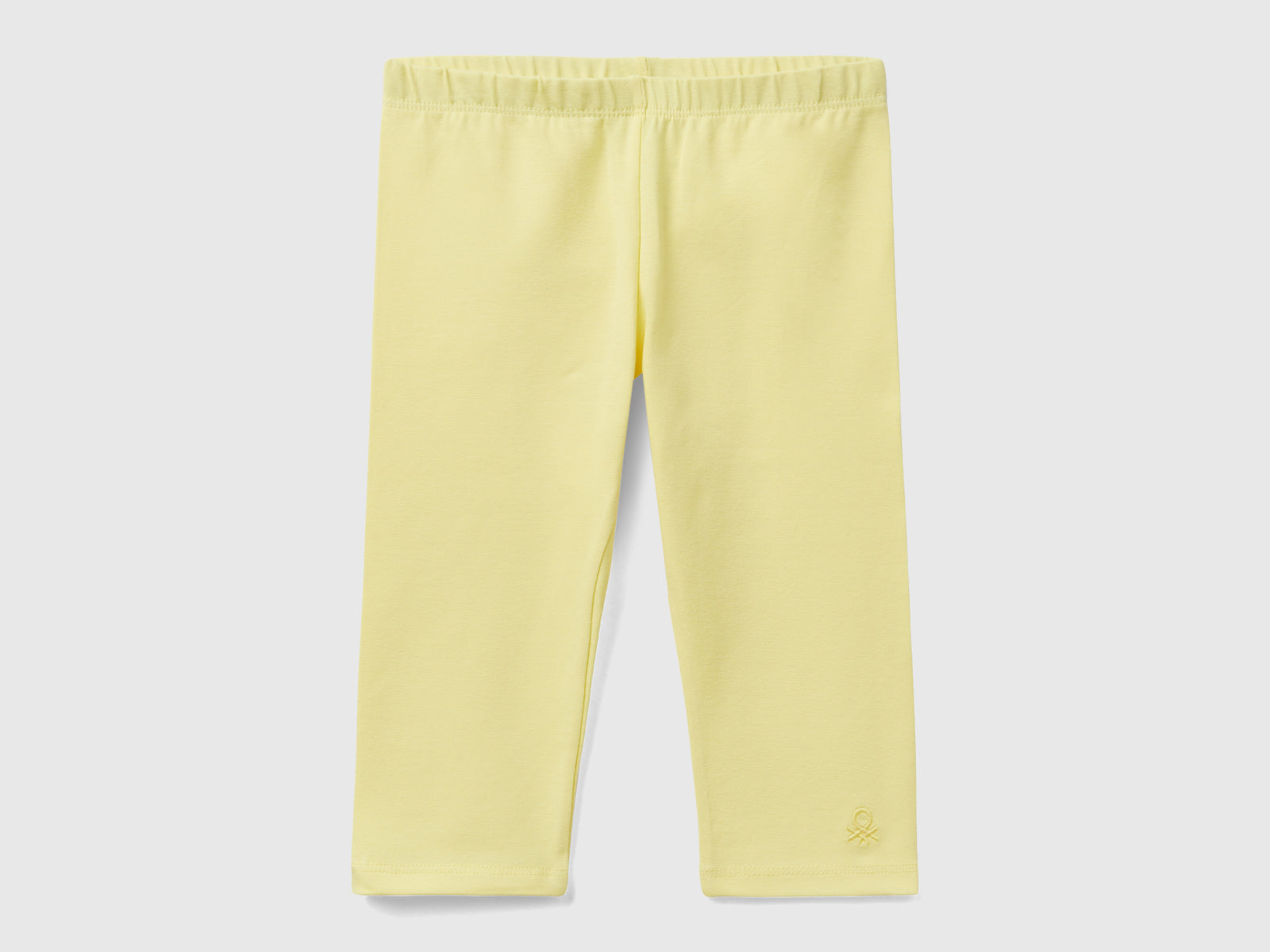 Leggings a 3/4 in cotone elasticizzato da bimba giallo | Benetton Outlet