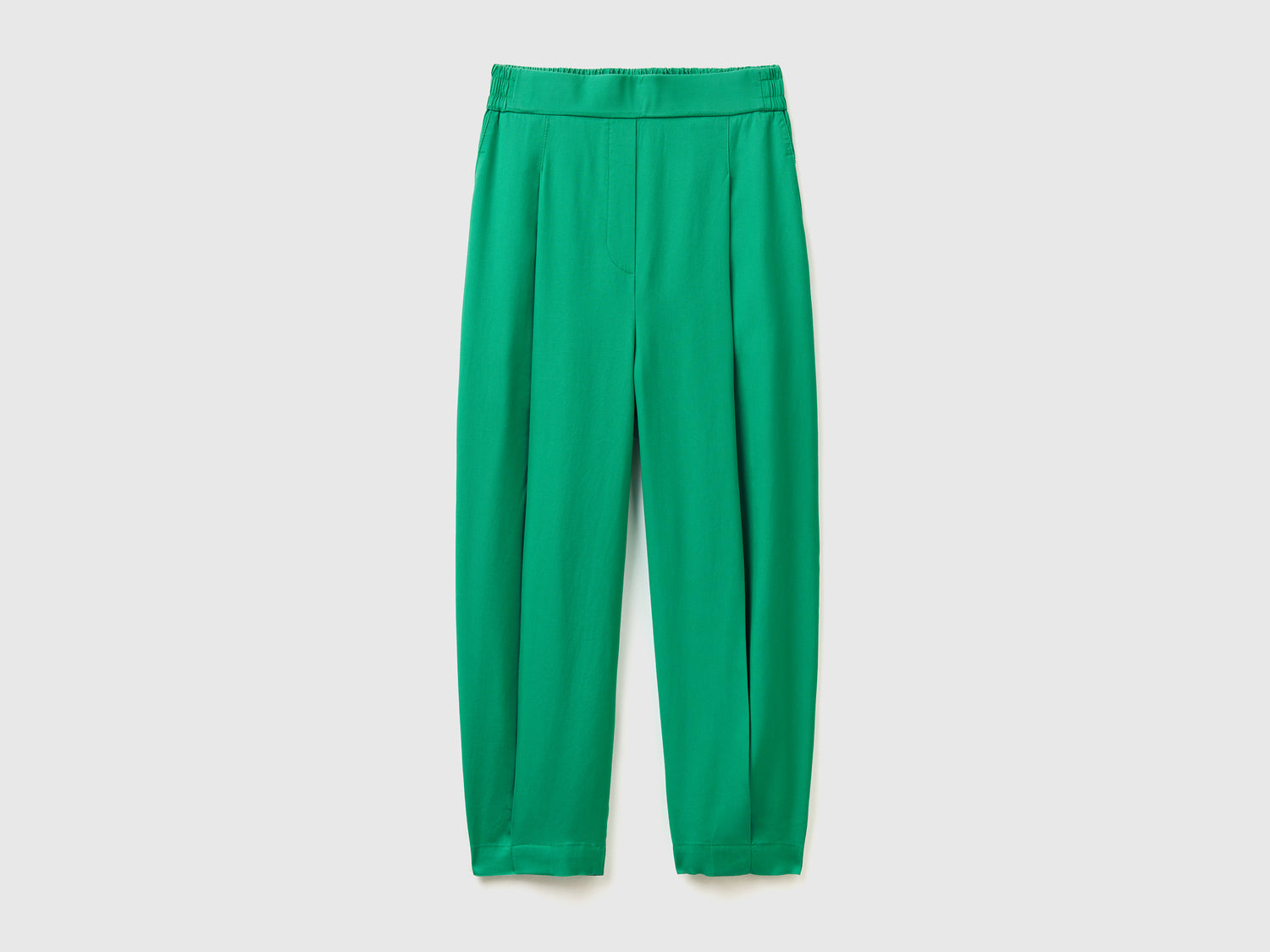 Pantaloni lunghi cropped in tessuto fluido da donna verde | Benetton Outlet