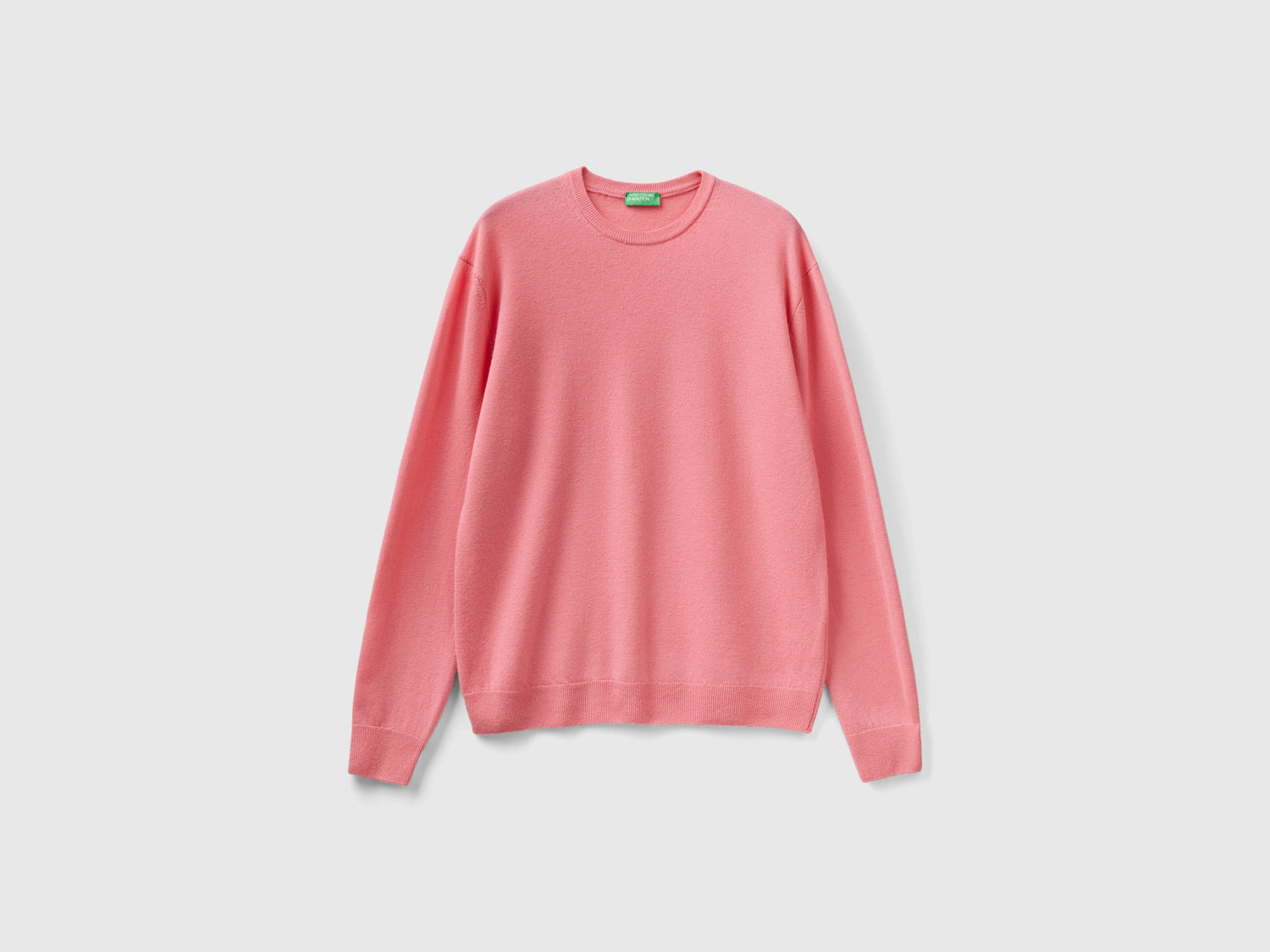Maglia girocollo rosa in pura lana Merino da uomo salmone | Benetton Outlet