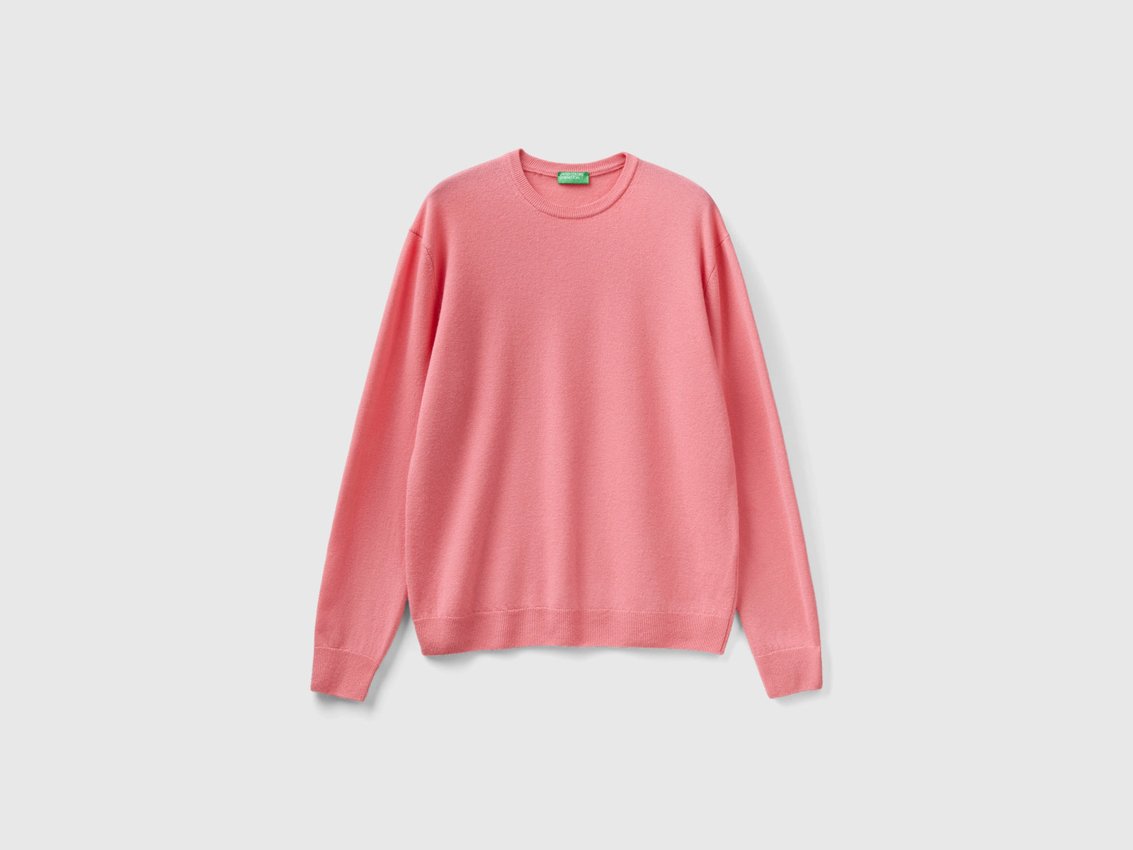 Maglia girocollo rosa in pura lana Merino da uomo salmone | Benetton Outlet