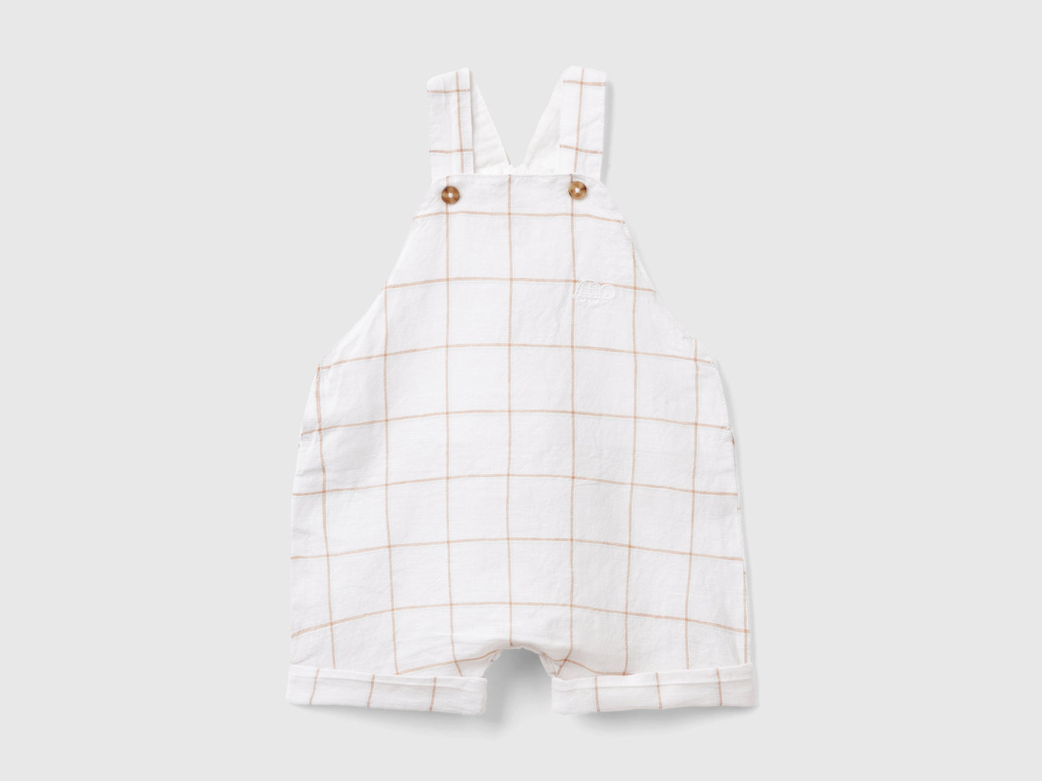Salopette a quadri in misto lino da neonato bianco | Benetton Outlet