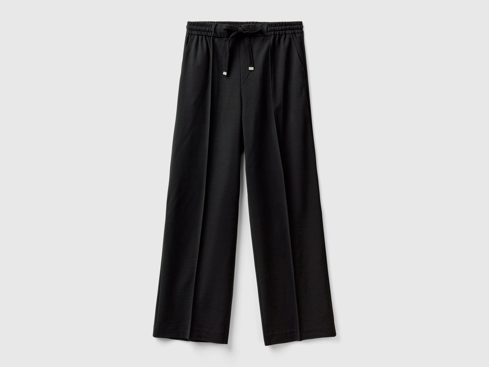 Pantaloni fluidi con coulisse da donna nero | Benetton Outlet