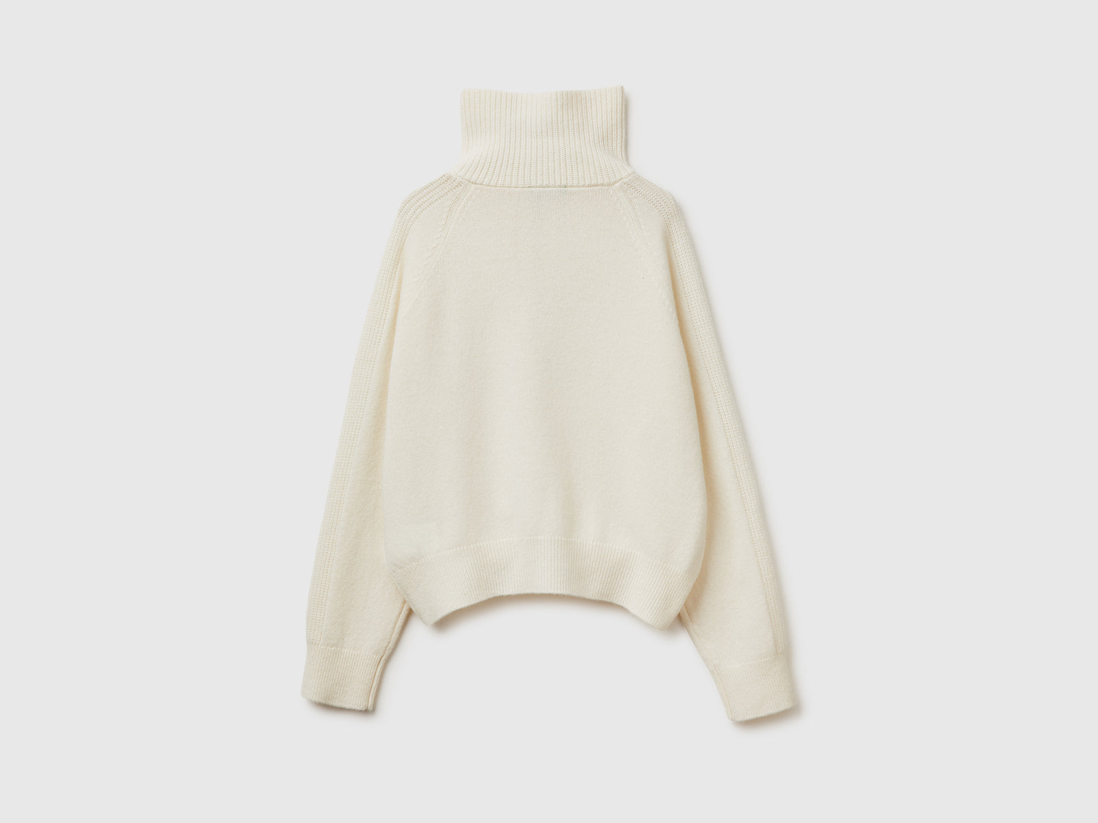 Maglia con mezza zip 100% lana da donna bianco panna 2 | Benetton Outlet