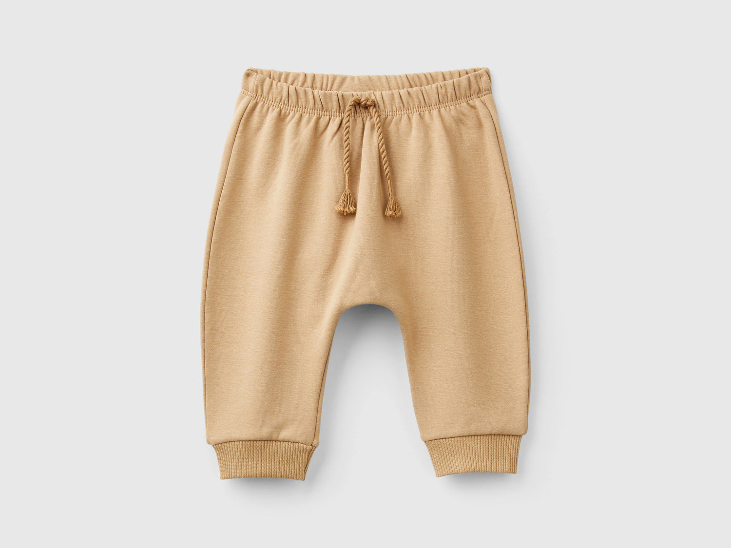 Pantaloni in calda felpa con taschino da neonato cammello | Benetton Outlet