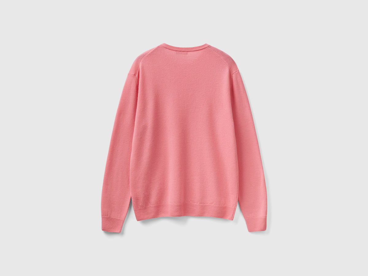 Maglia girocollo rosa in pura lana Merino
