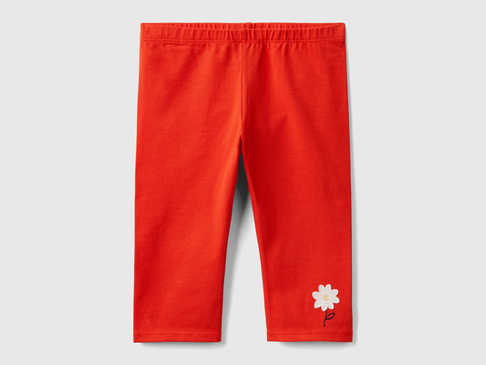 Leggings con fiori ricamati da bimba rosso | Benetton Outlet