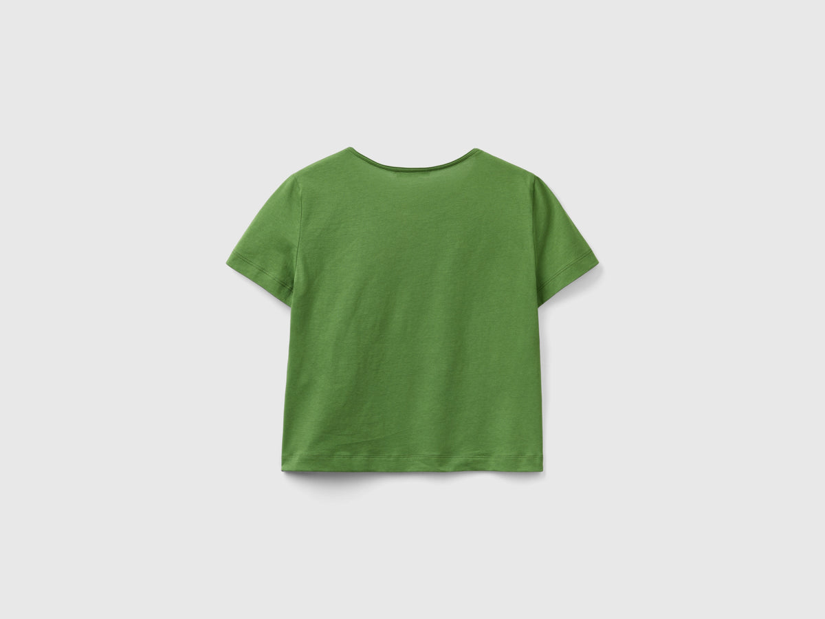 T-shirt a manica corta con spacco