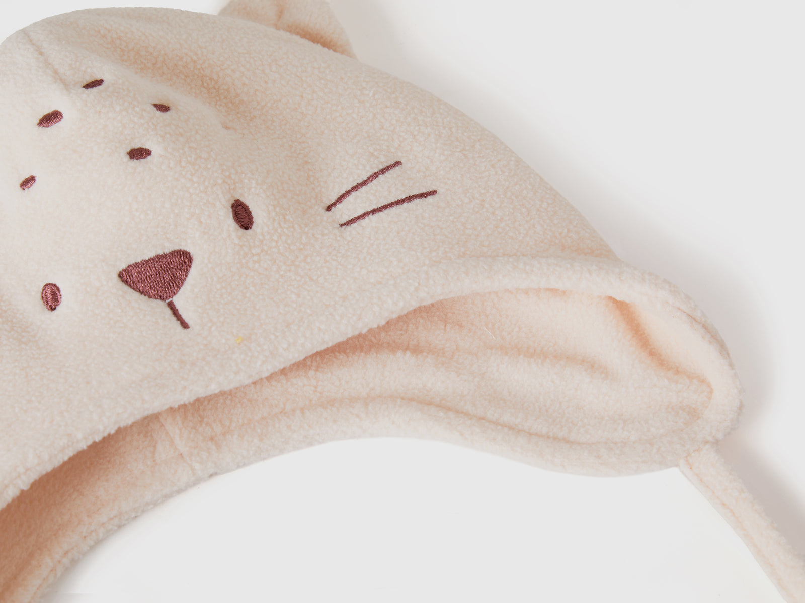 Cappello con paraorecchie in pile da neonato rosa tenue 3 | Benetton Outlet