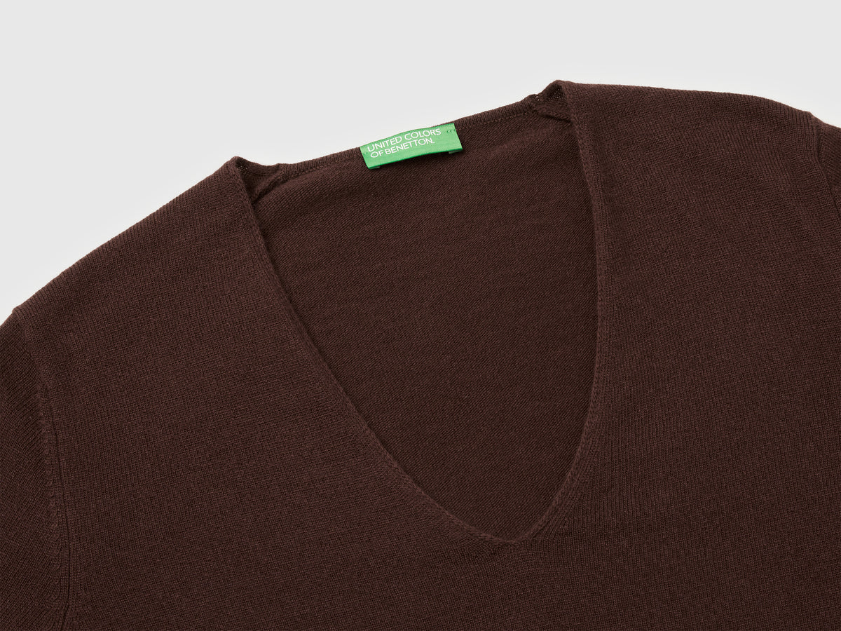 Maglione con scollo a V in pura lana Merino