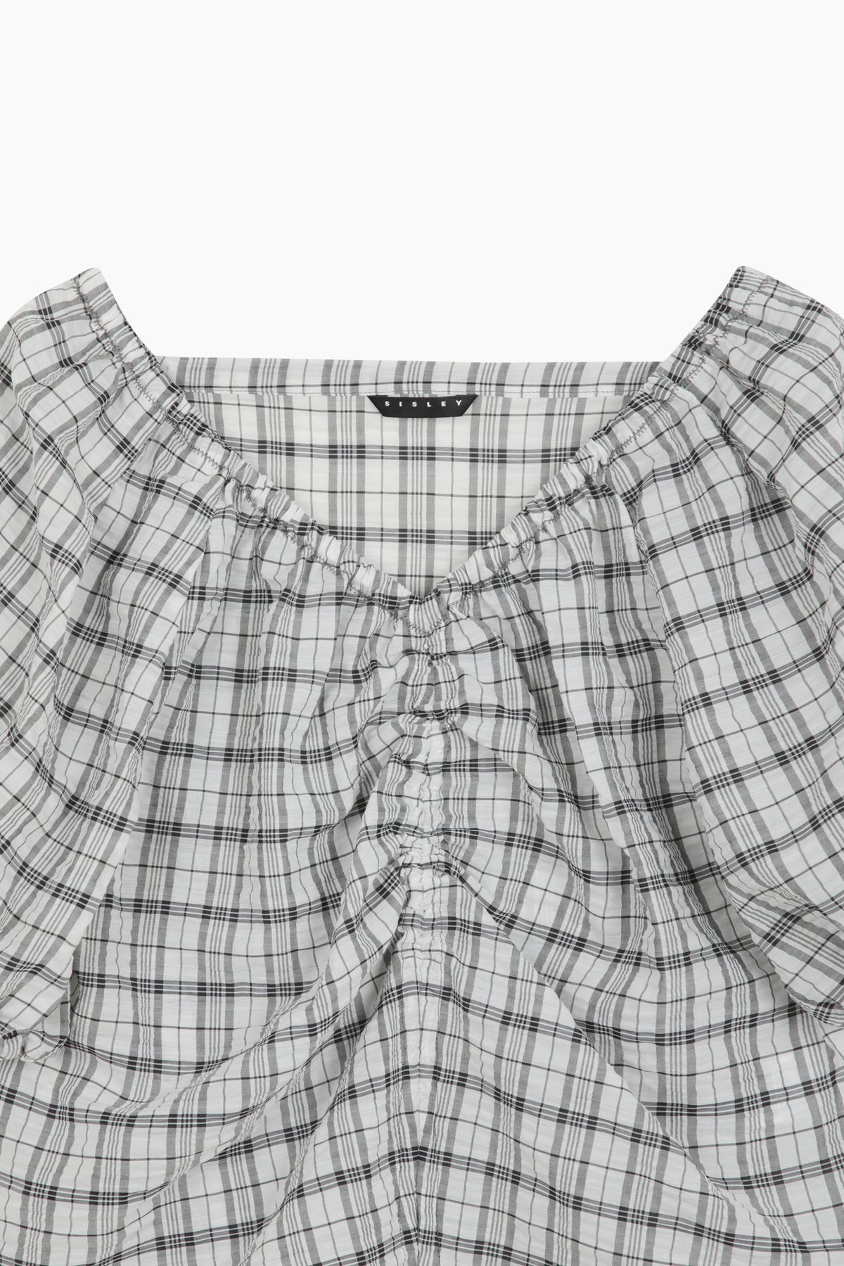 Blusa a quadri con arriccio