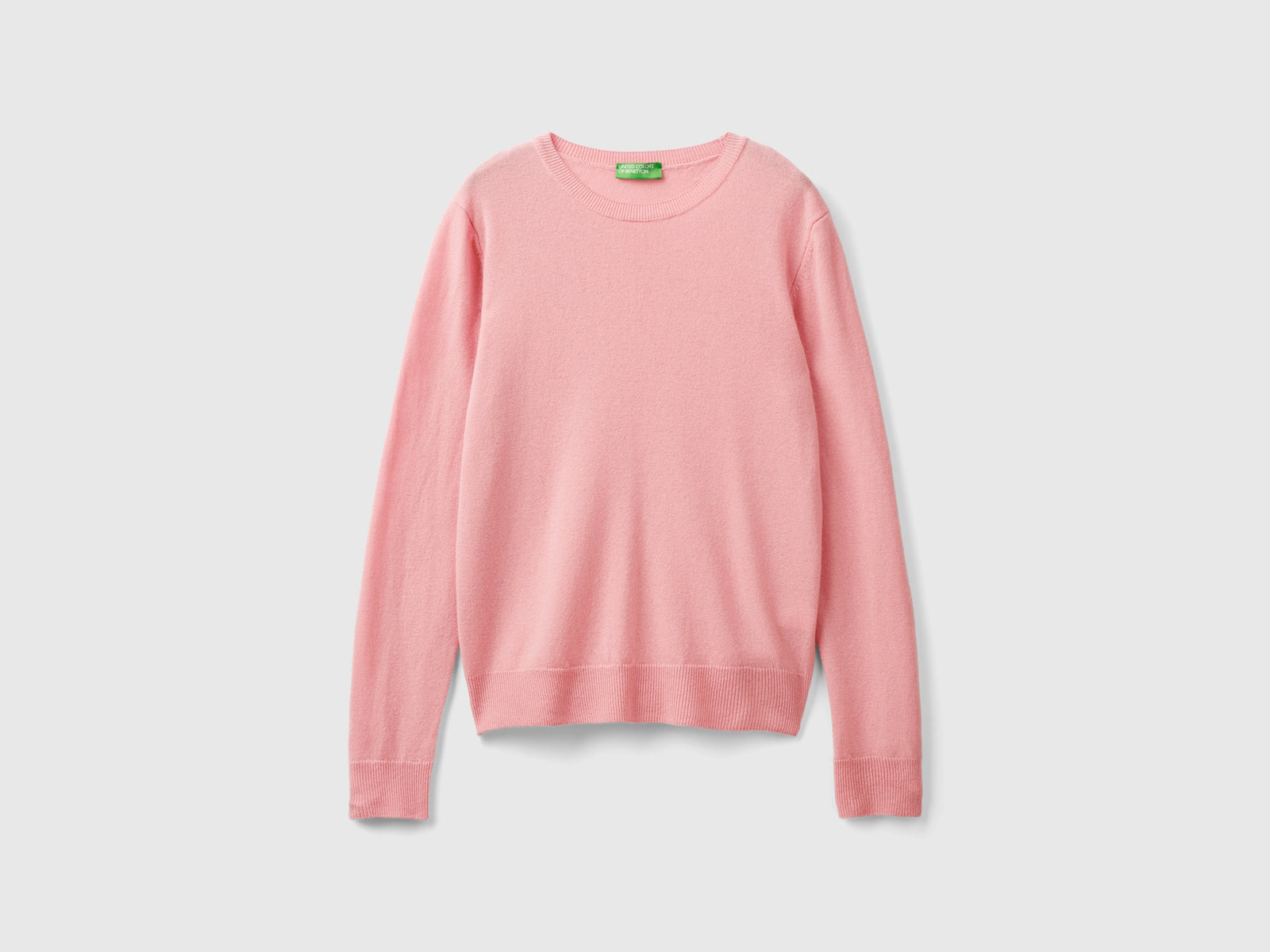 Crewneck sweater in pure Merino wool da donna rosa | Benetton Outlet