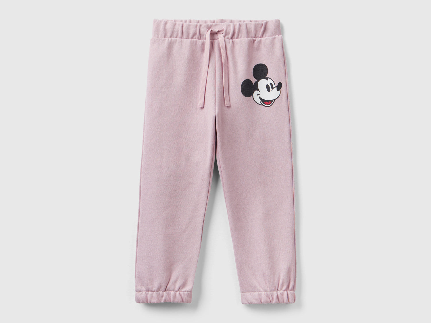 Joggers rosa Mickey Mouse da bimbo rosa tenue | Benetton Outlet