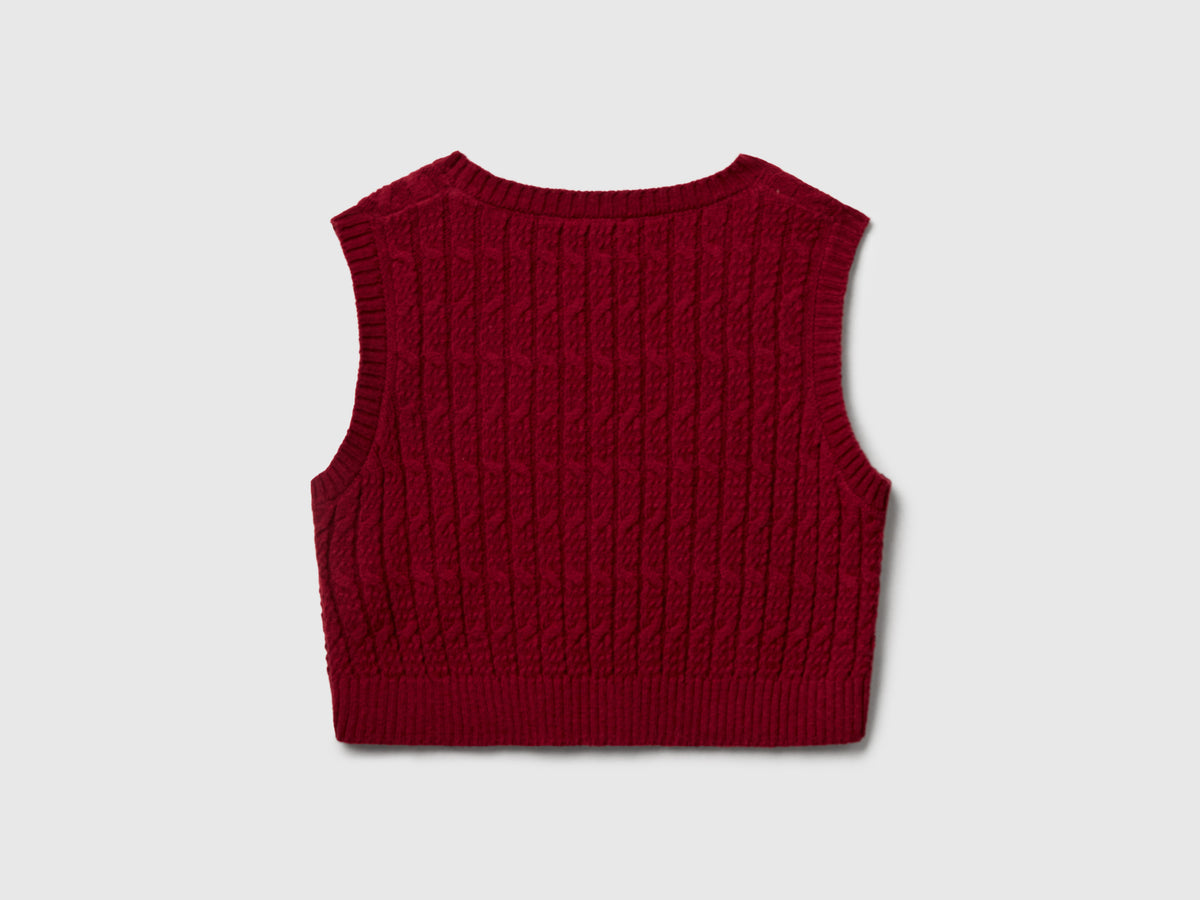 Gilet in maglia con trecce