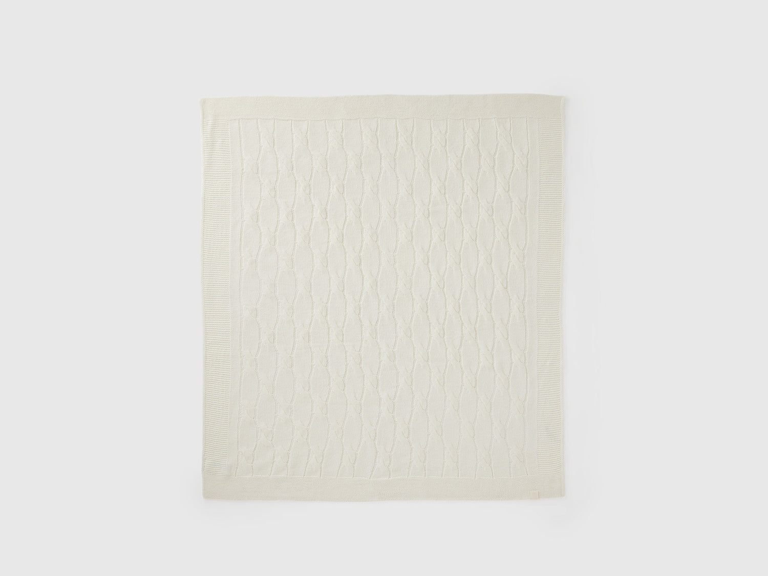 Coperta con trecce da neonato bianco panna | Benetton Outlet