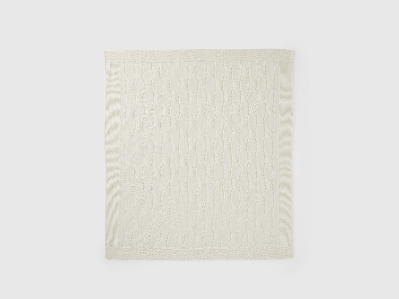 Coperta con trecce da neonato bianco panna | Benetton Outlet