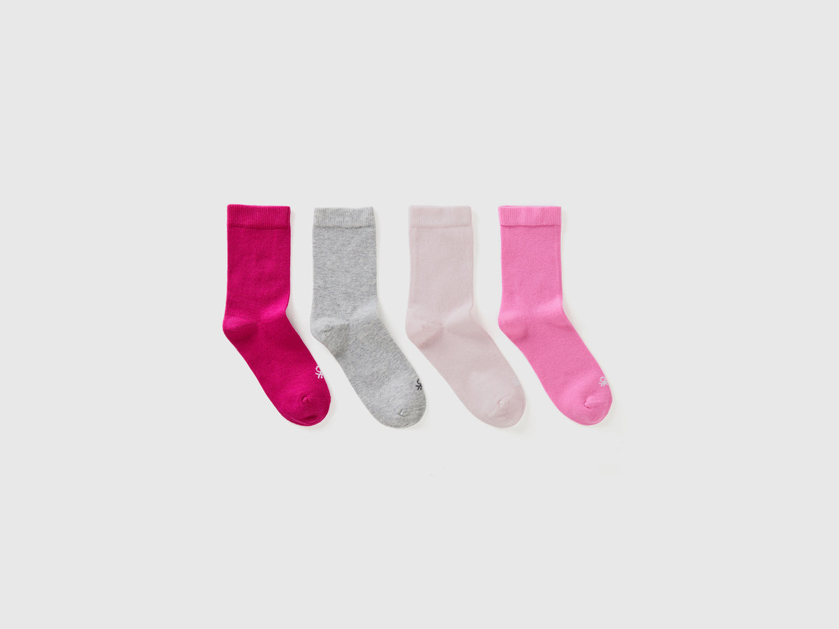 Quattro paia di calze in cotone  stretch da bambino multi-color | Benetton Outlet