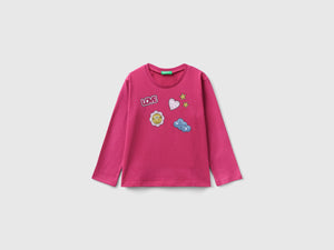 Calda t-shirt con stampa e glitter