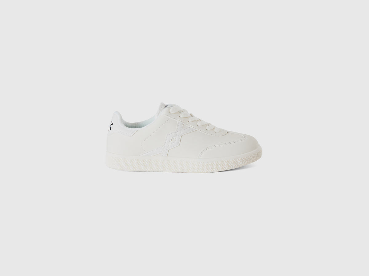 Sneakers in tessuto spalmato