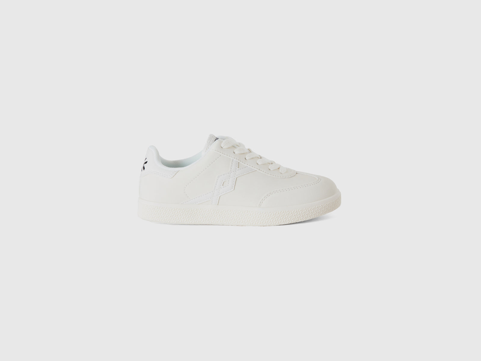 Sneakers in tessuto spalmato da bambina bianco panna | Benetton Outlet