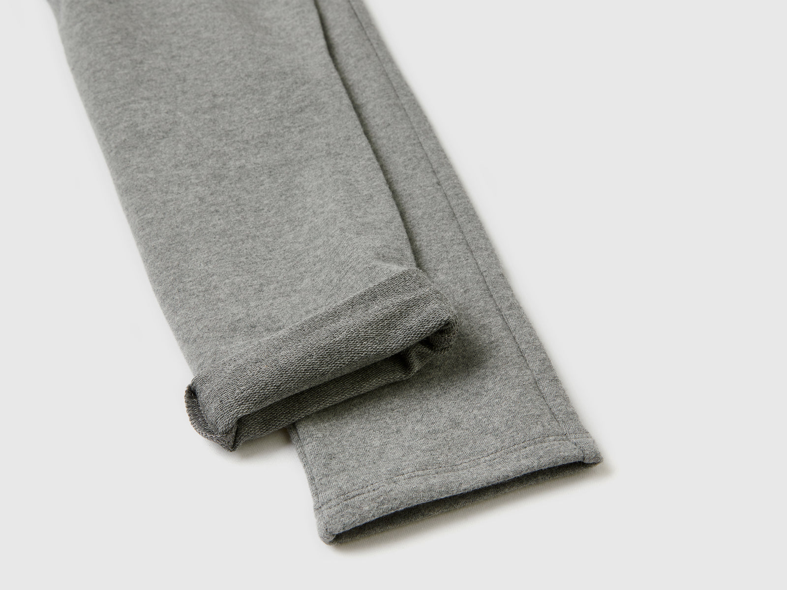 Leggings in felpa stretch da bambina grigio scuro 2 | Benetton Outlet
