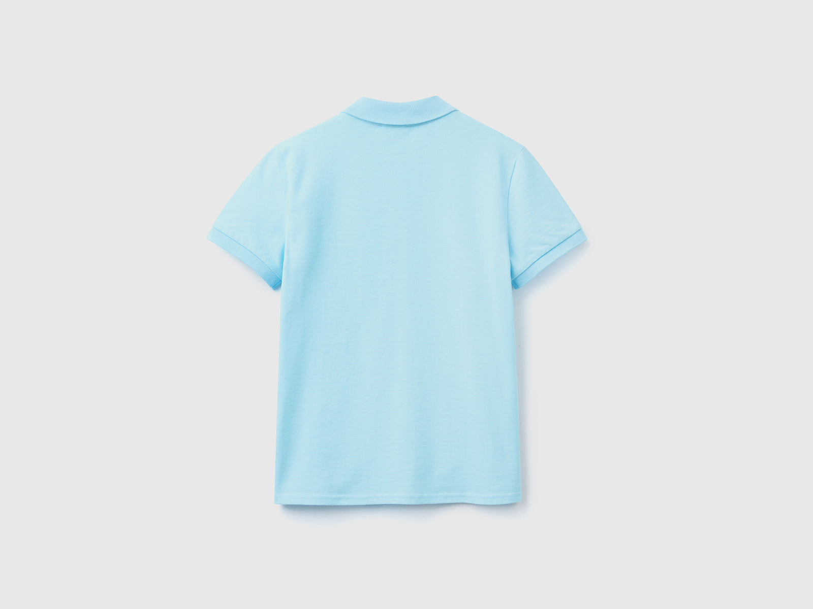 Polo con ricamo frutta da donna azzurro 2 | Benetton Outlet