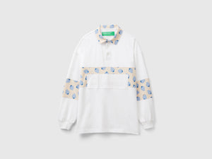 Polo rugby con dettagli pattern fragole