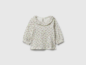 T-shirt a fiori con colletto