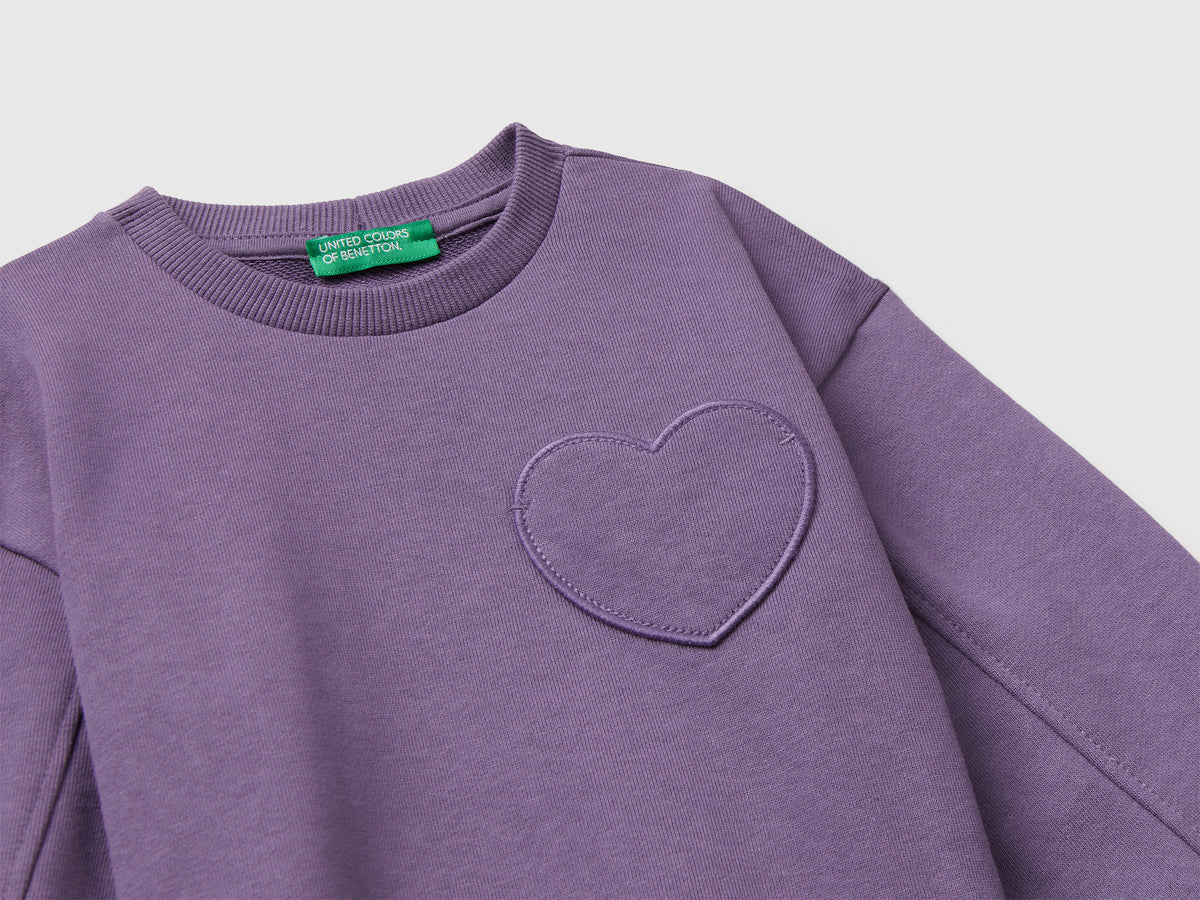 Felpa con patch cuore