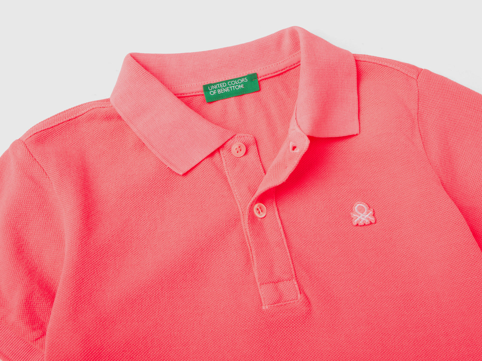 Polo fluo in cotone biologico da bimbo rosa fluo 2 | Benetton Outlet