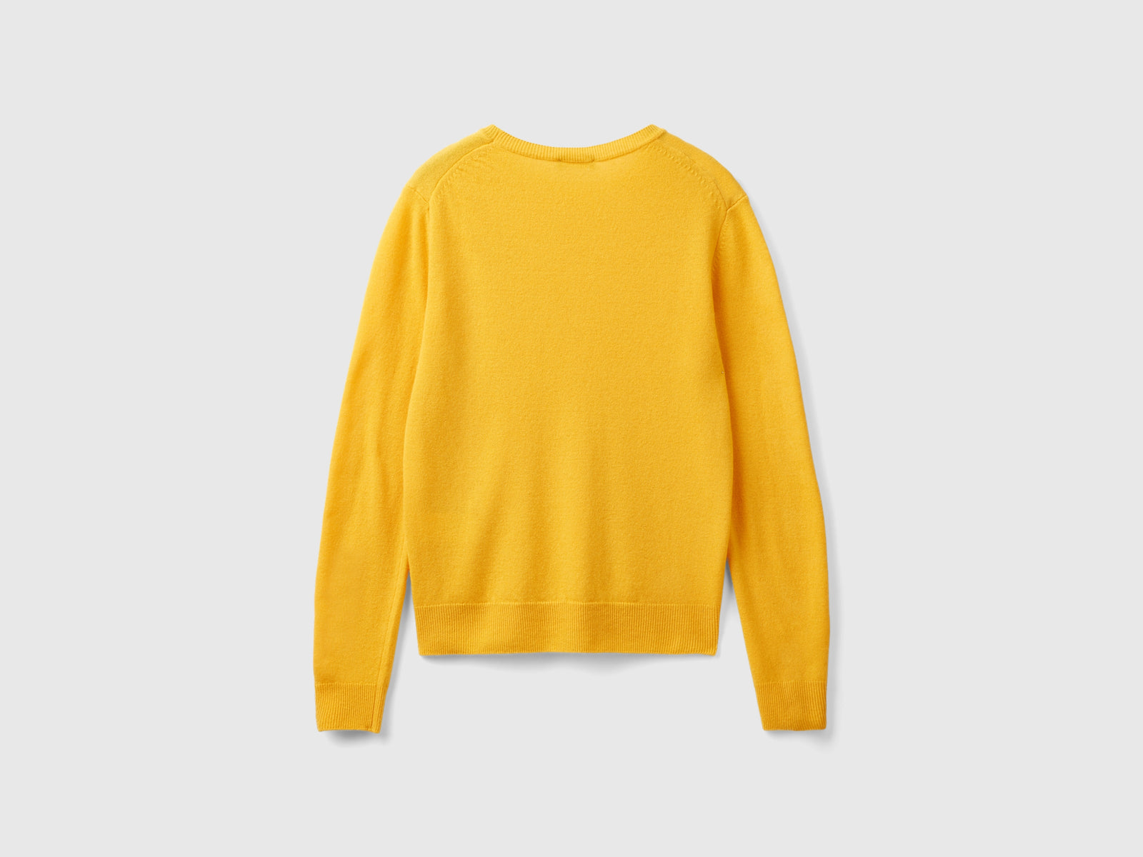 Maglia girocollo giallo ocra in pura lana Merino da donna senape 2 | Benetton Outlet