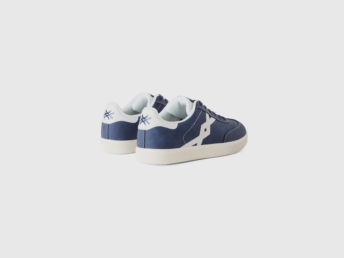 Sneakers in tessuto spalmato