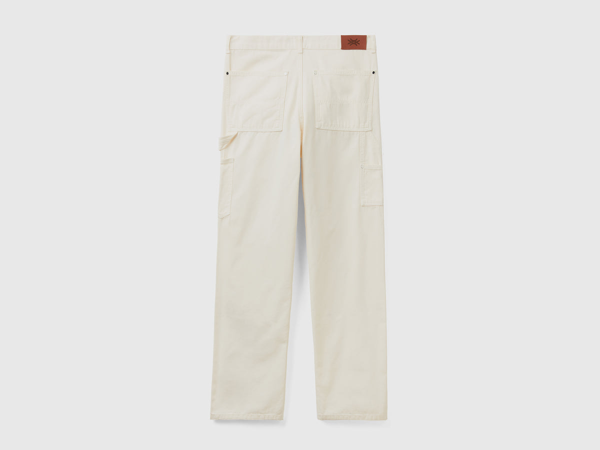 Pantaloni lunghi in puro cotone tinto in capo con impunture a contrasto