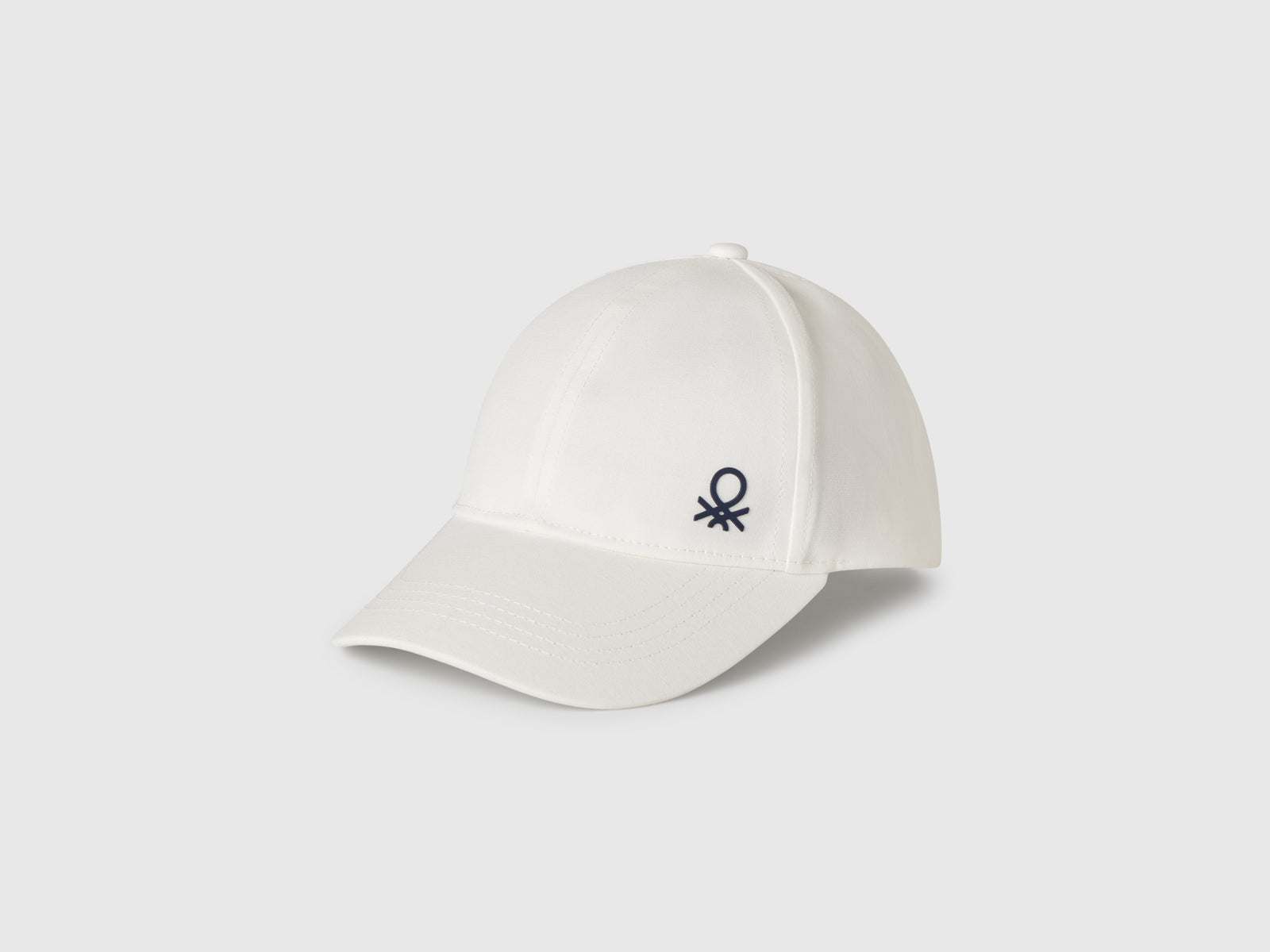 Cappellino in cotone con logo da bimbo bianco | Benetton Outlet