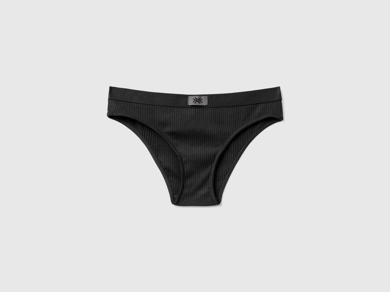 Slip fianco basso a costine da donna nero | Benetton Outlet