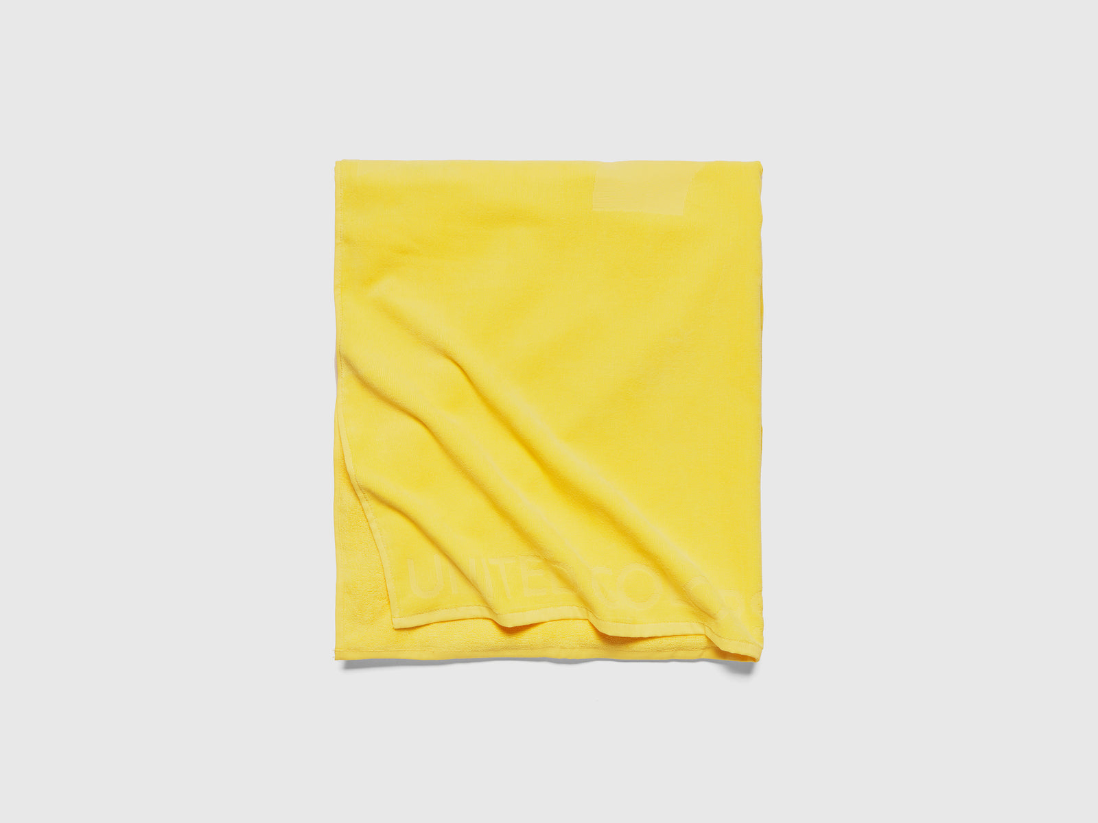 Telo mare in spugna da uomo giallo 3 | Benetton Outlet