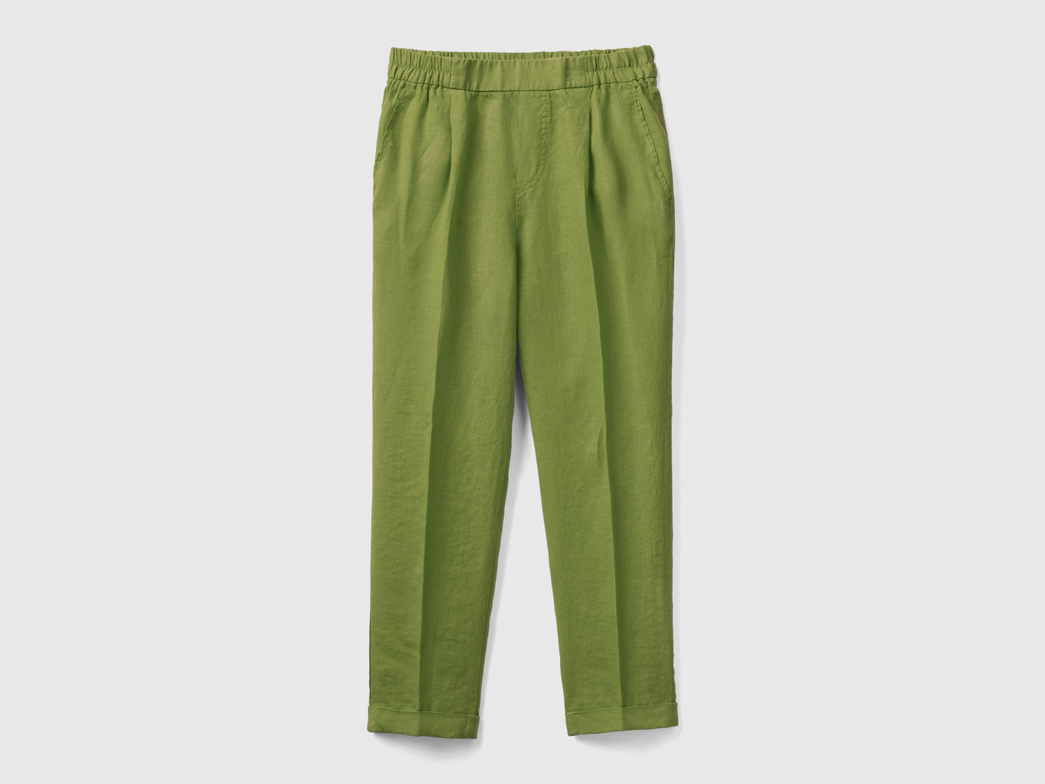 Pantaloni lunghi in puro lino con taglio cropped e gamba affusolata da donna verde | Benetton Outlet